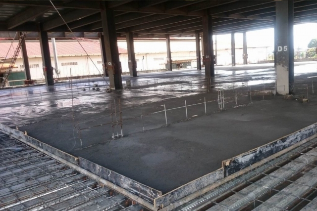 Finished pouring of concrete on metal deck.